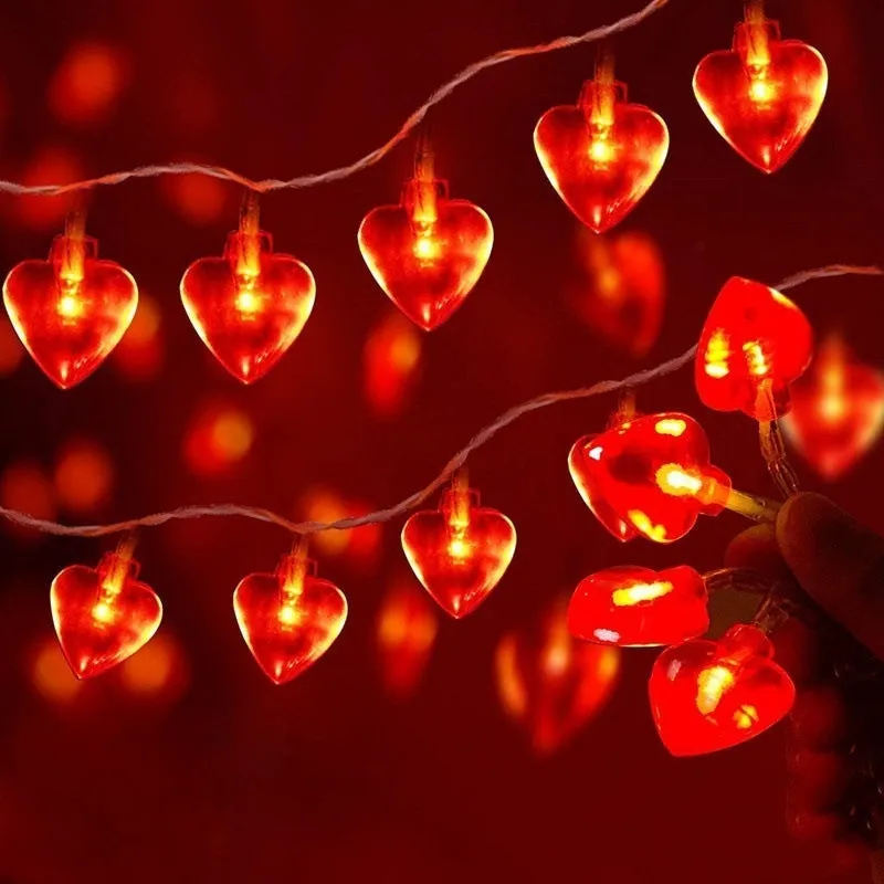 Love Lamp LED string lights with red plastic lamps, battery operated, IP43 rated, 2800 lumens