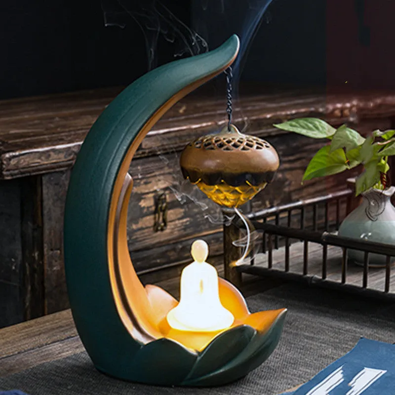 Ceramic backflow aroma diffuser decoration Buddha statue with manual pottery finish and luminous glow
