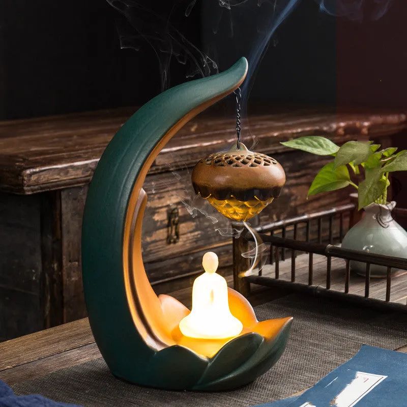 Ceramic backflow aroma diffuser decoration Buddha statue with manual pottery finish and luminous glow