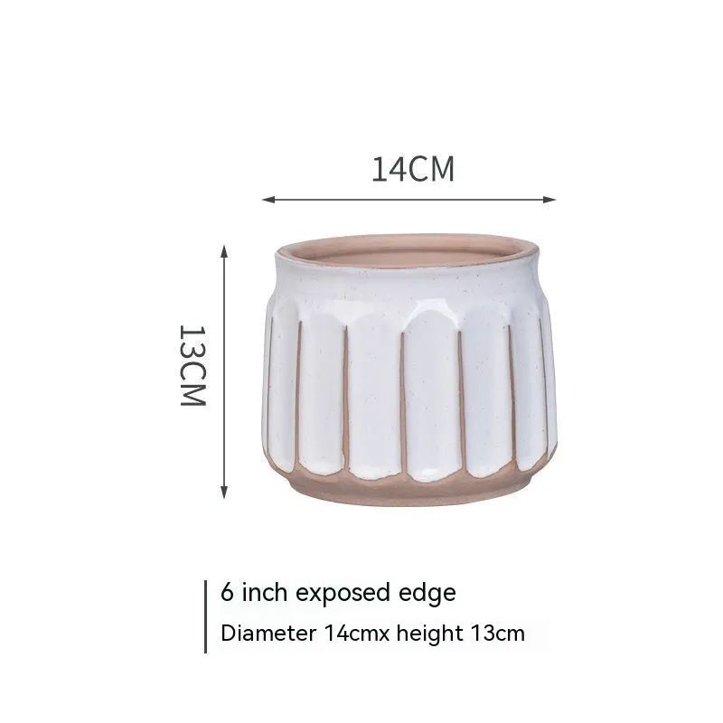 Nordic simple striped ceramic flower pot in white, 14x13cm size, on a desktop with a small plant