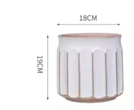 Nordic simple striped ceramic flower pot in white, 14x13cm size, on a desktop with a small plant