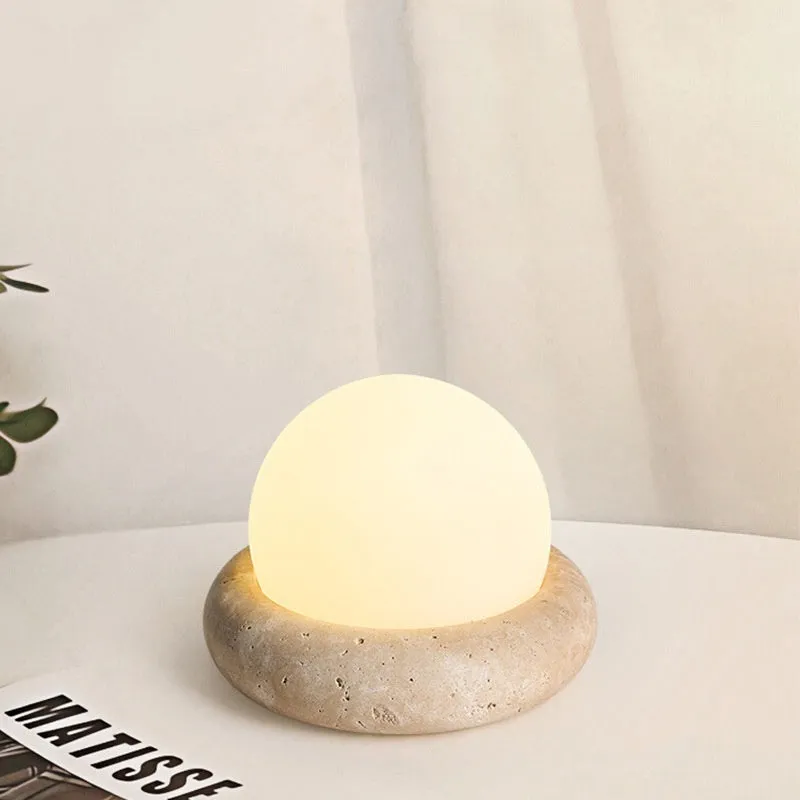Cream remote control rechargeable bedside lamp with yellow cave stone glow