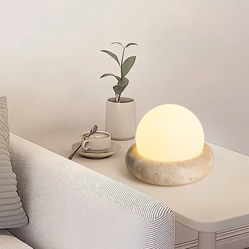 Cream remote control rechargeable bedside lamp with yellow cave stone glow