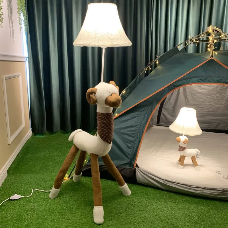 Hand-knitted cloth children's cartoon floor lamp with Christmas deer or lion design in a bedroom setting