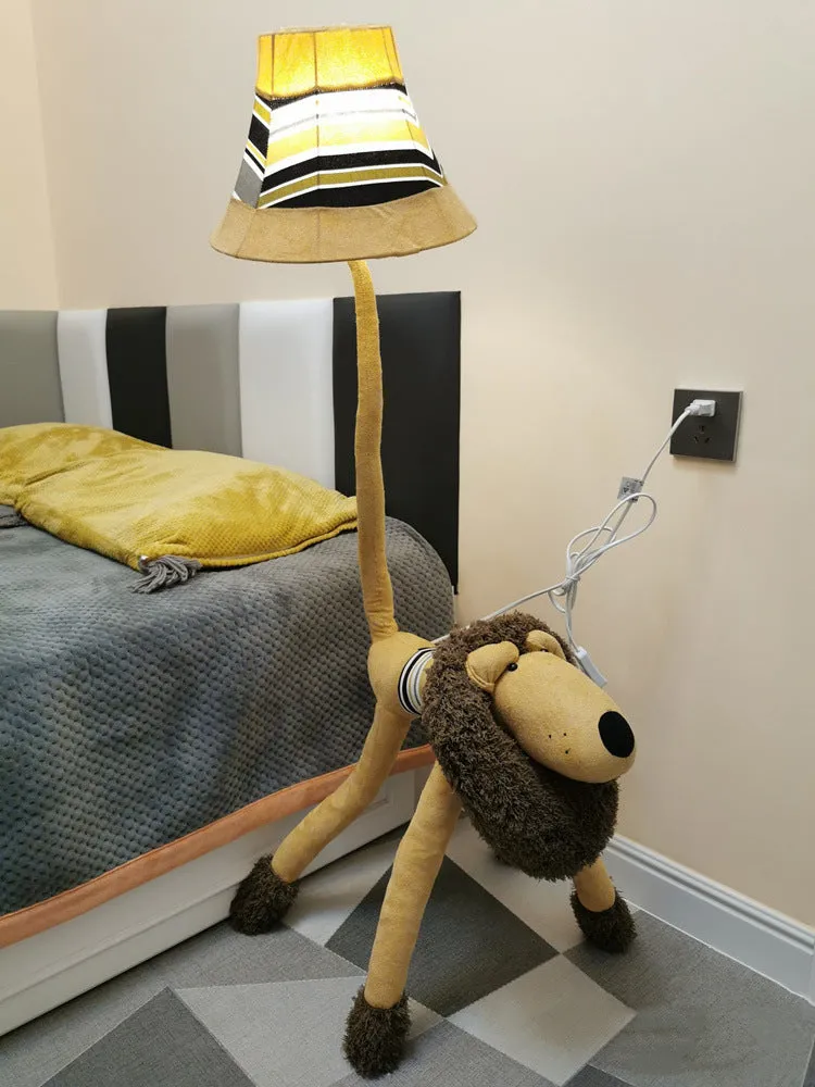 Hand-knitted cloth children's cartoon floor lamp with Christmas deer or lion design in a bedroom setting