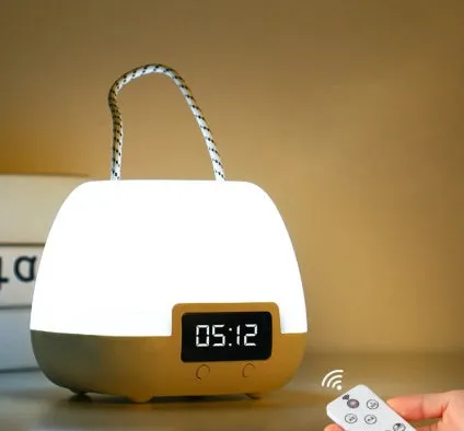 White rechargeable night light for breastfeeding with remote control, projection function, and USB charging for bedside use