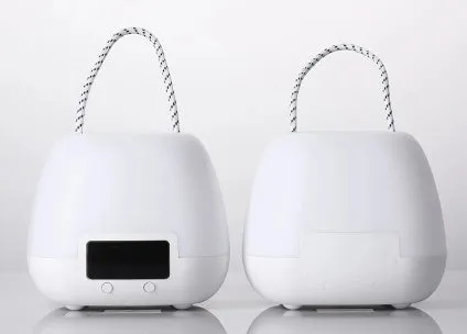 White rechargeable night light for breastfeeding with remote control, projection function, and USB charging for bedside use