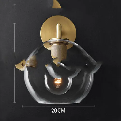 Modern wrought iron glass wall lamp with gold bronze finish and triangular transparent glass shade