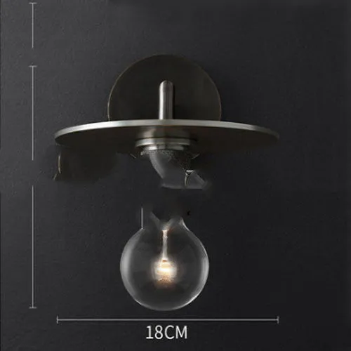 Modern wrought iron glass wall lamp with gold bronze finish and triangular transparent glass shade