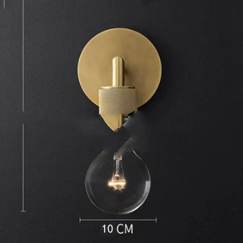 Modern wrought iron glass wall lamp with gold bronze finish and triangular transparent glass shade