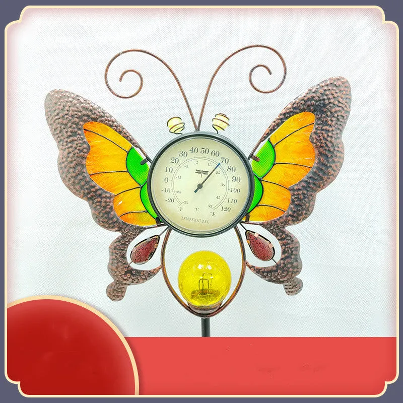 Solar garden thermometer butterfly stake measuring 30x6x110cm inserted in lawn
