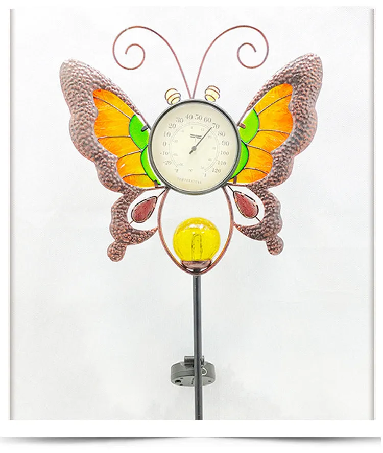 Solar garden thermometer butterfly stake measuring 30x6x110cm inserted in lawn