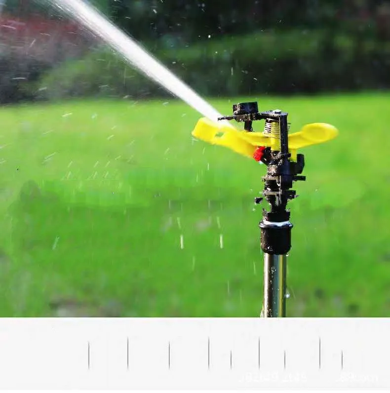 Automatic 360-degree rotating sprinkler on tripod for garden lawn irrigation with adjustable height and spray angle