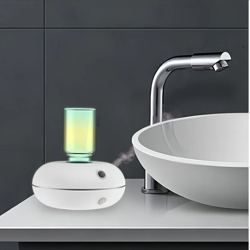 White automatic sensor fragrance machine mini USB diffuser for home bathroom use on a shelf