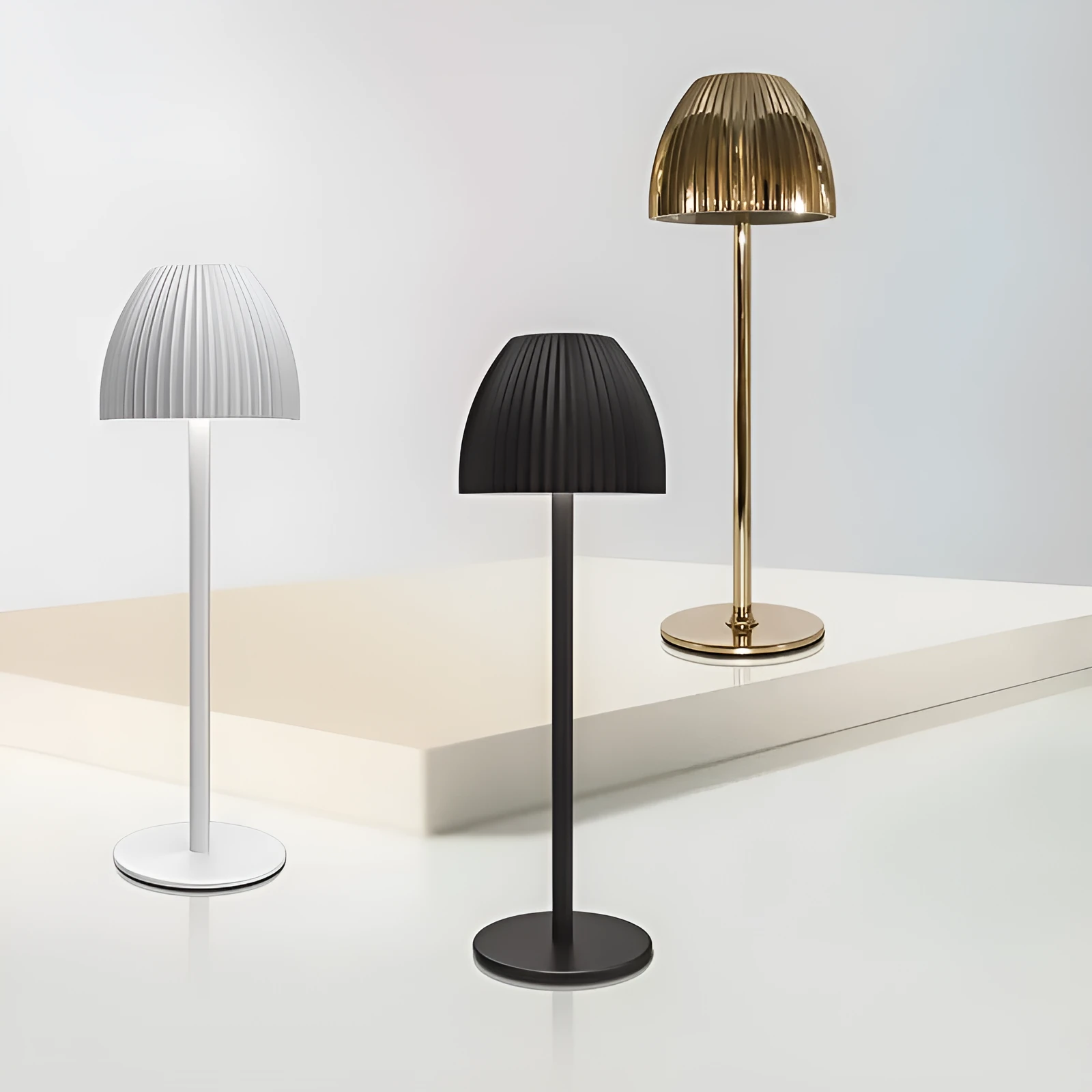 Modern dimmable night lamp with circular base in black or white colour options