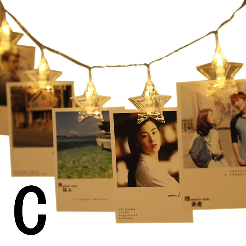 LED star clip festoon lights on a dark background showing warm white 3-metre string with 20 star-shaped lamps