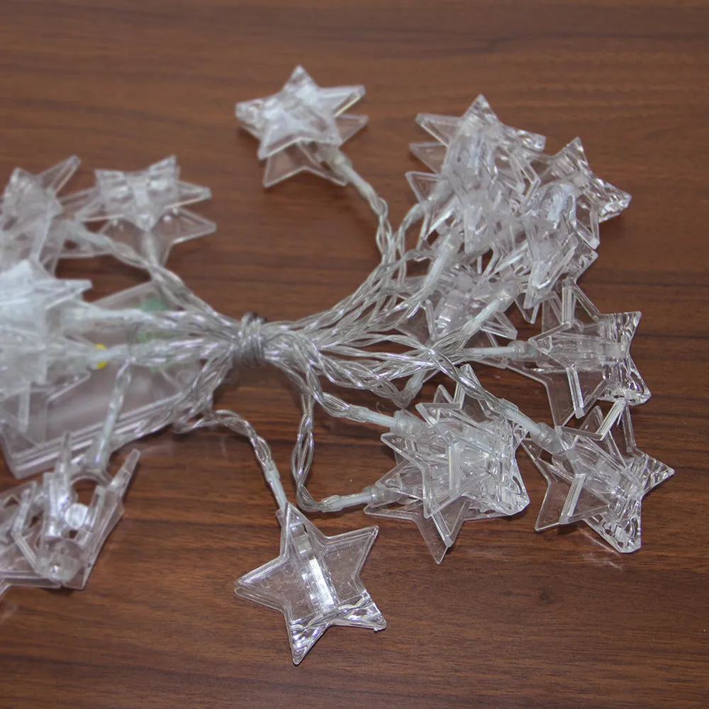 LED star clip festoon lights on a dark background showing warm white 3-metre string with 20 star-shaped lamps