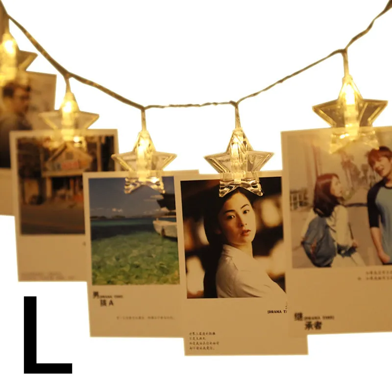 LED star clip festoon lights on a dark background showing warm white 3-metre string with 20 star-shaped lamps