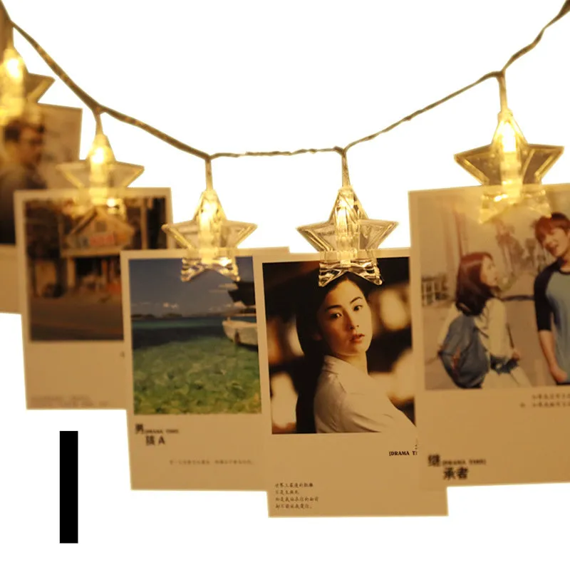 LED star clip festoon lights on a dark background showing warm white 3-metre string with 20 star-shaped lamps