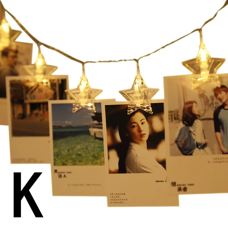 LED star clip festoon lights on a dark background showing warm white 3-metre string with 20 star-shaped lamps