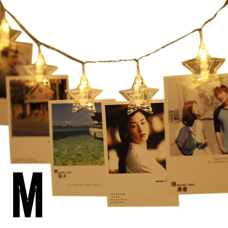 LED star clip festoon lights on a dark background showing warm white 3-metre string with 20 star-shaped lamps