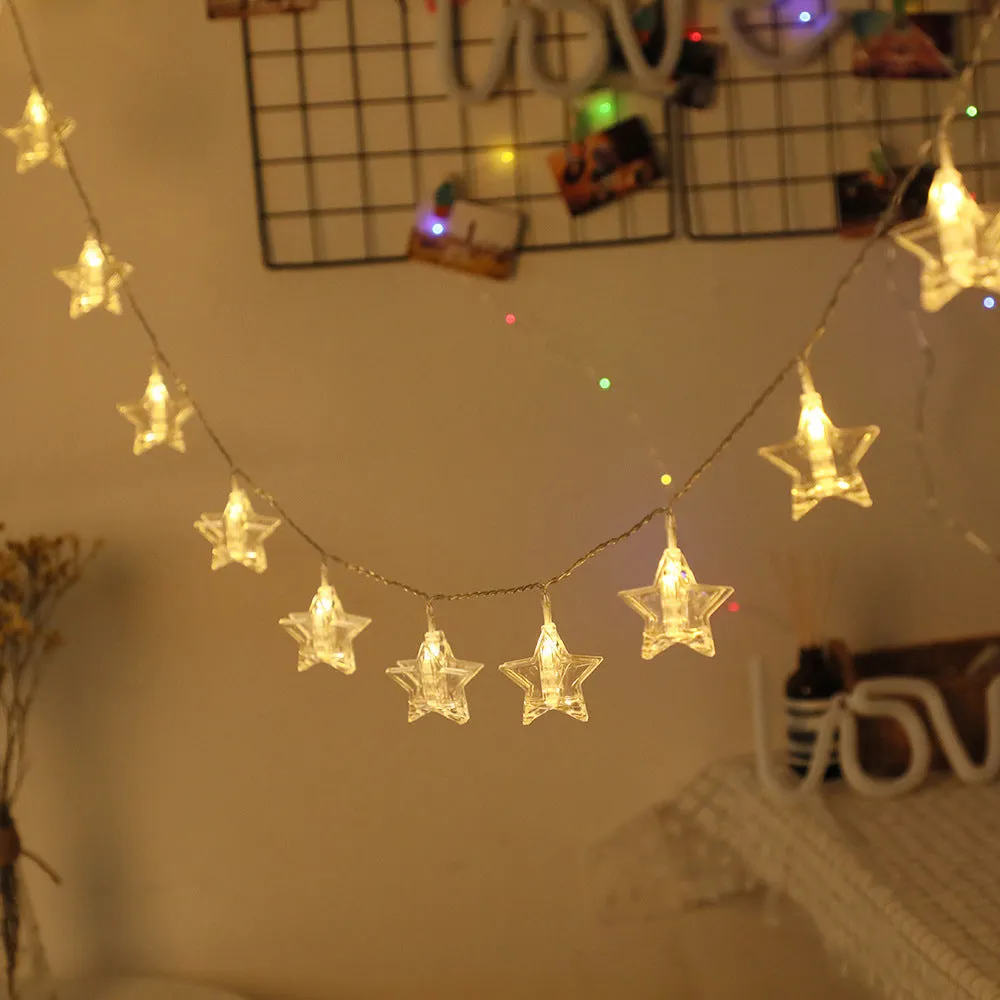 LED star clip festoon lights on a dark background showing warm white 3-metre string with 20 star-shaped lamps