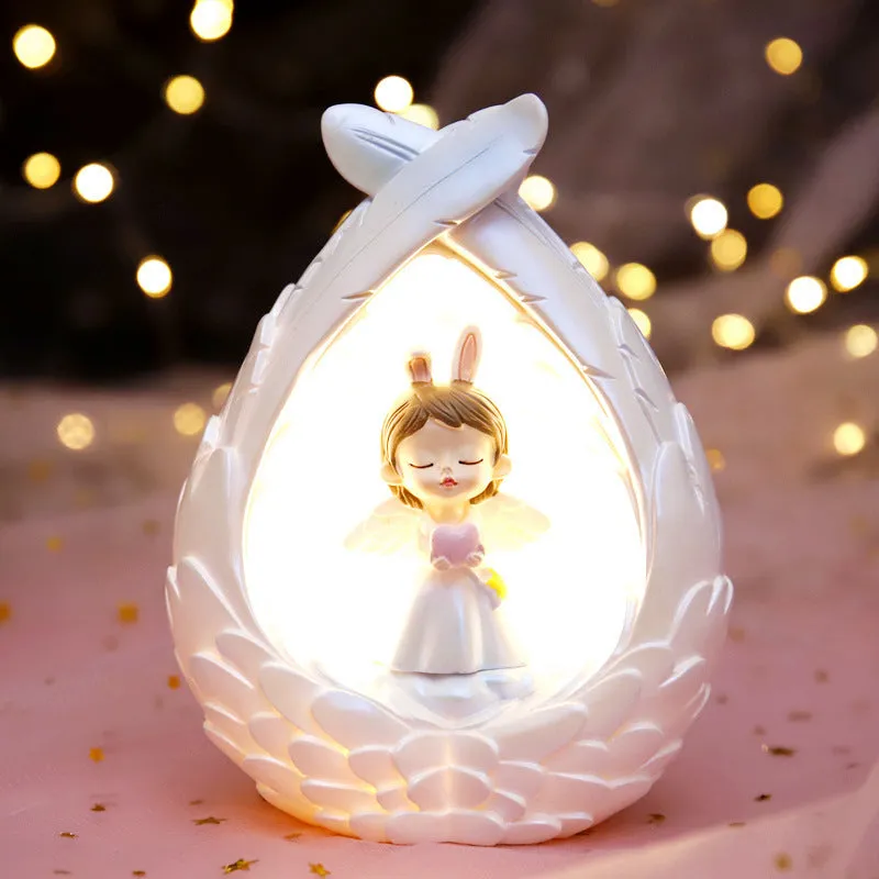 Angel wings star light made of synthetic resin with star and wing design, available in prayer or love style options