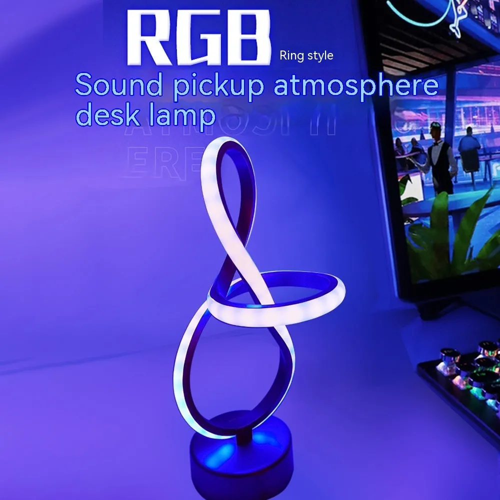 Black musical note shaped Bluetooth LED night light with remote control on a bedside table.