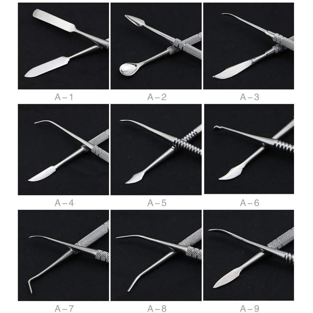 Ten stainless steel clay knives with photo colour handles arranged on a surface for pottery sculpting work.