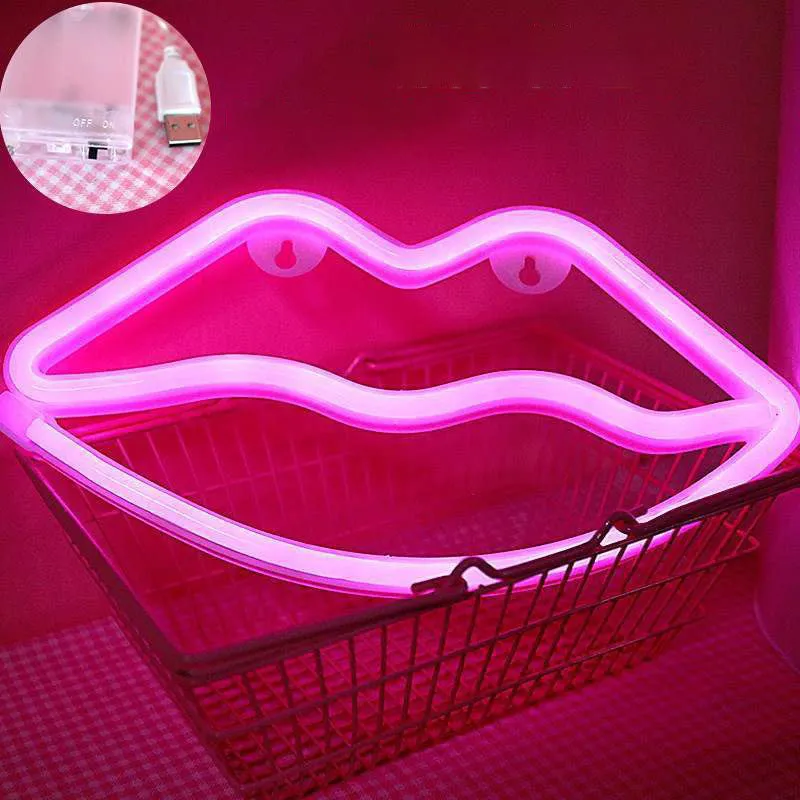 Pink lips-shaped neon light sign on wall with USB cable and battery backup
