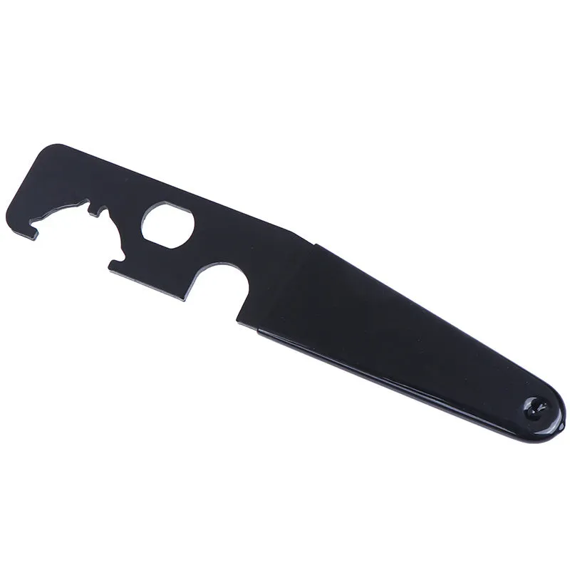 Black steel and rubber multi-function tactical wrench on dark surface showing slim 20.8cm profile