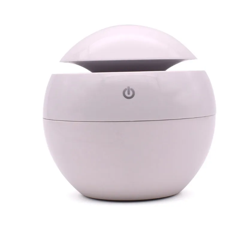 USB ultrasonic atomizer with colourful light and 130ml water tank in white colour option on a wooden desk