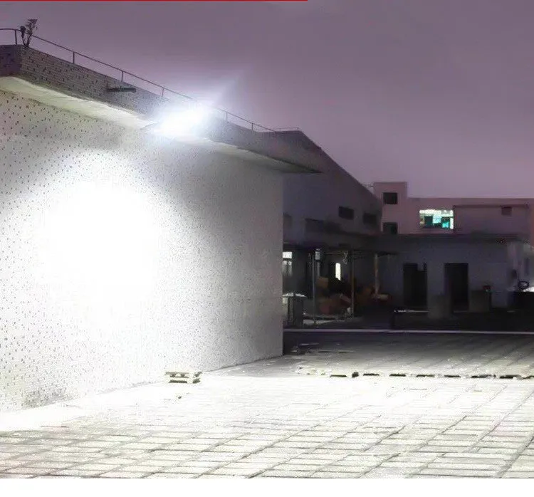 Black solar-powered outdoor motion sensor light with IP65 waterproof rating for garden and driveway security.