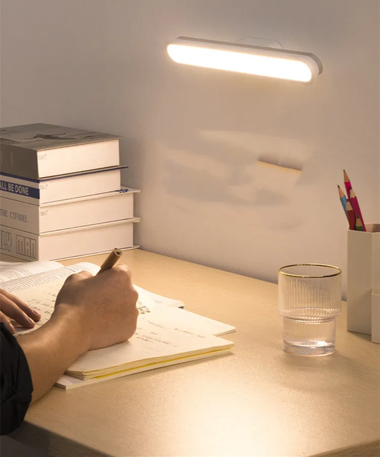 Baseus magnetic LED desk lamp hanging on a wardrobe rail, white, with touch switch and USB port