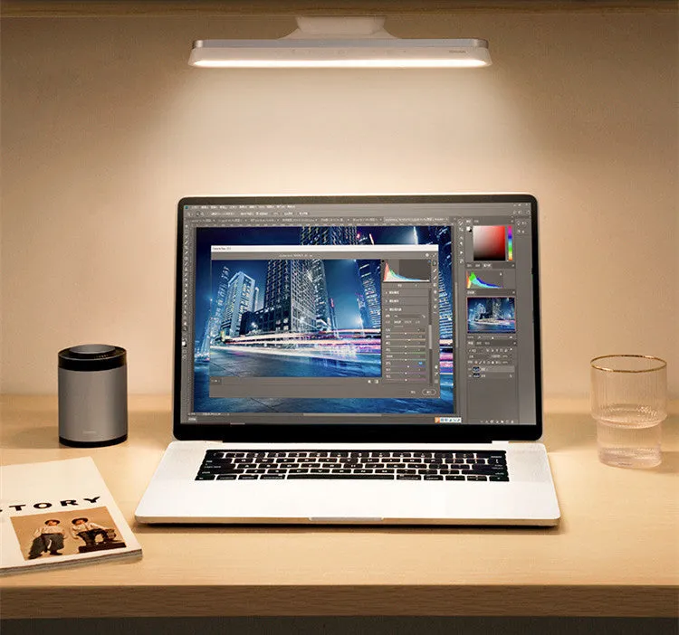 Baseus magnetic LED desk lamp hanging on a wardrobe rail, white, with touch switch and USB port