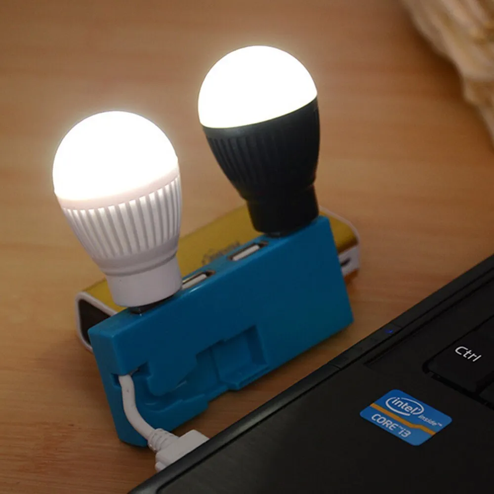 Mini USB LED lamp portable night light in black with USB cable, showing compact design for travel use