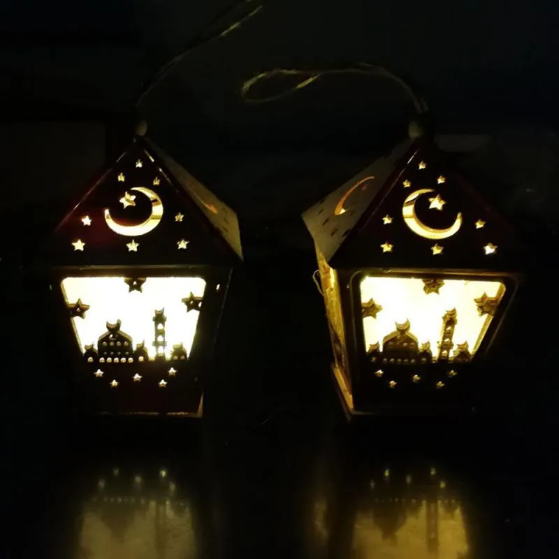 Three-dimensional carved boxwood house pendant with LED lights in blue colour option