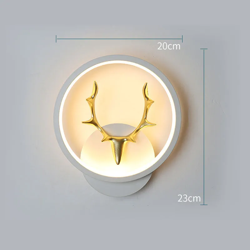 Deer antler shaped wall lamp with remote control for dimmable LED lighting in three colour temperatures.
