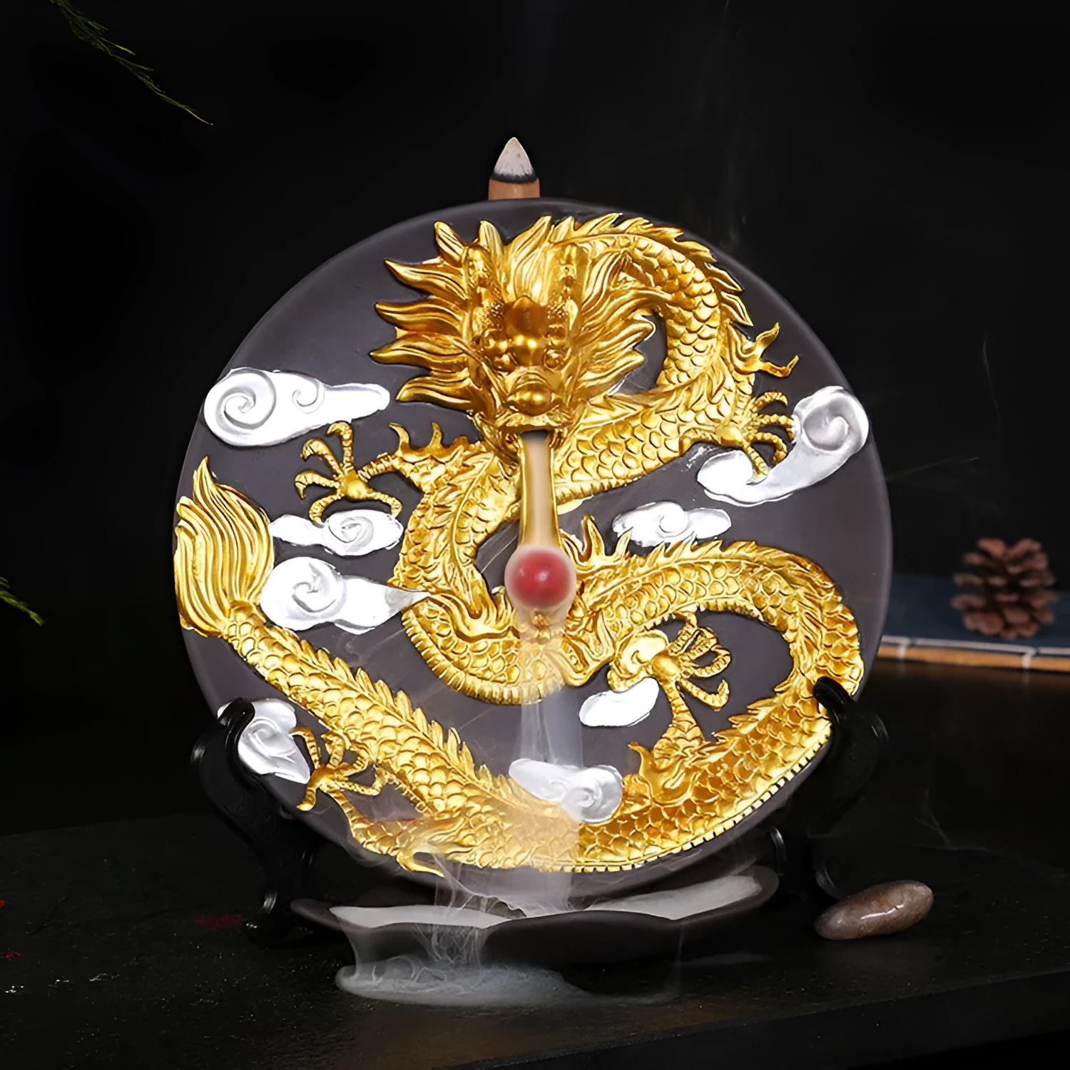 Ceramic backflow incense burner in Yellow Golden Dragon Plate colour on a table
