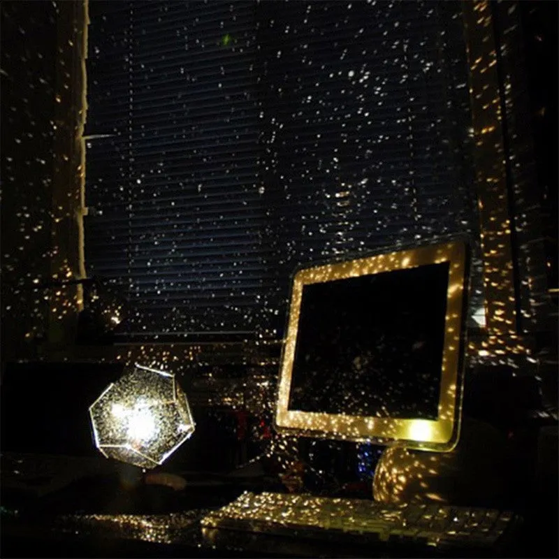 LED starry sky projector night lamp showing constellation projections on a bedroom ceiling with remote control