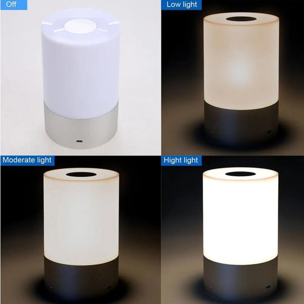 Creative home bedside night light LED lamp with dimmable white and colour light on a desk