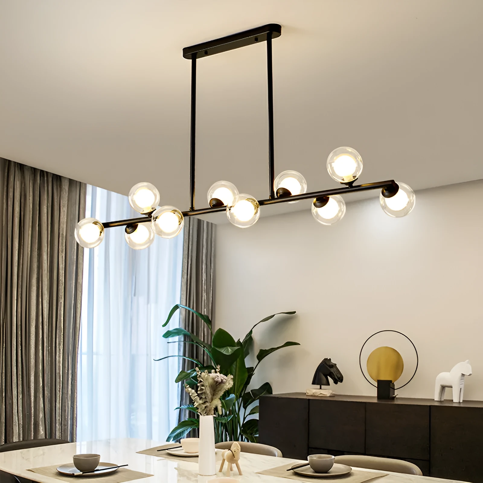 Modern minimalist glass bubble ball chandelier with 6 black arms and clear glass shades