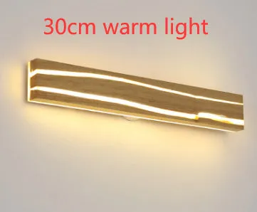 Solid wood bedroom LED wall light in log colour with rubber wood and acrylic construction