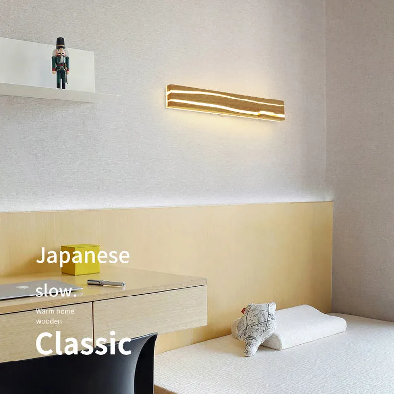 Solid wood bedroom LED wall light in log colour with rubber wood and acrylic construction