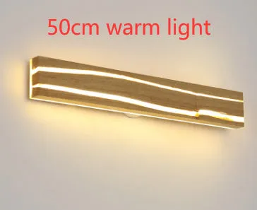 Solid wood bedroom LED wall light in log colour with rubber wood and acrylic construction