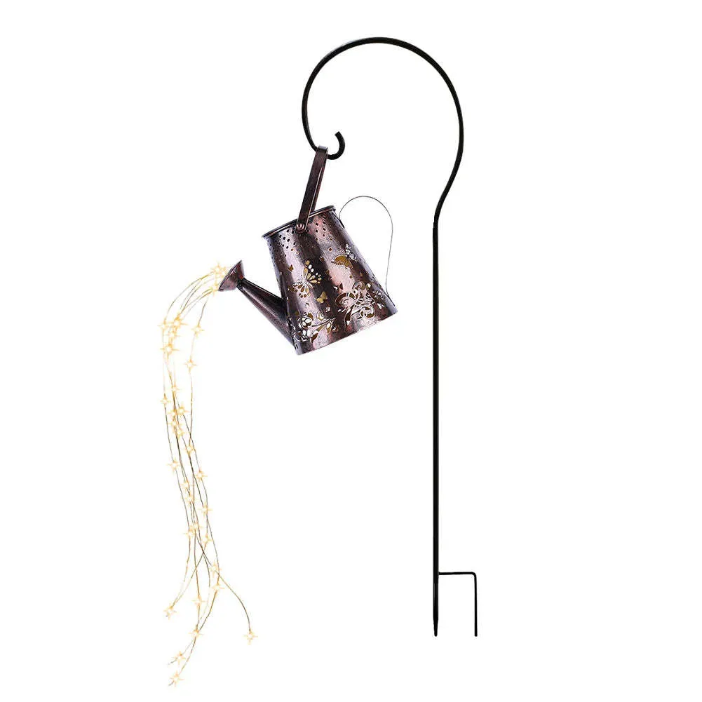 Iron solar garden lamp with tapered butterfly pattern and warm white LED light.
