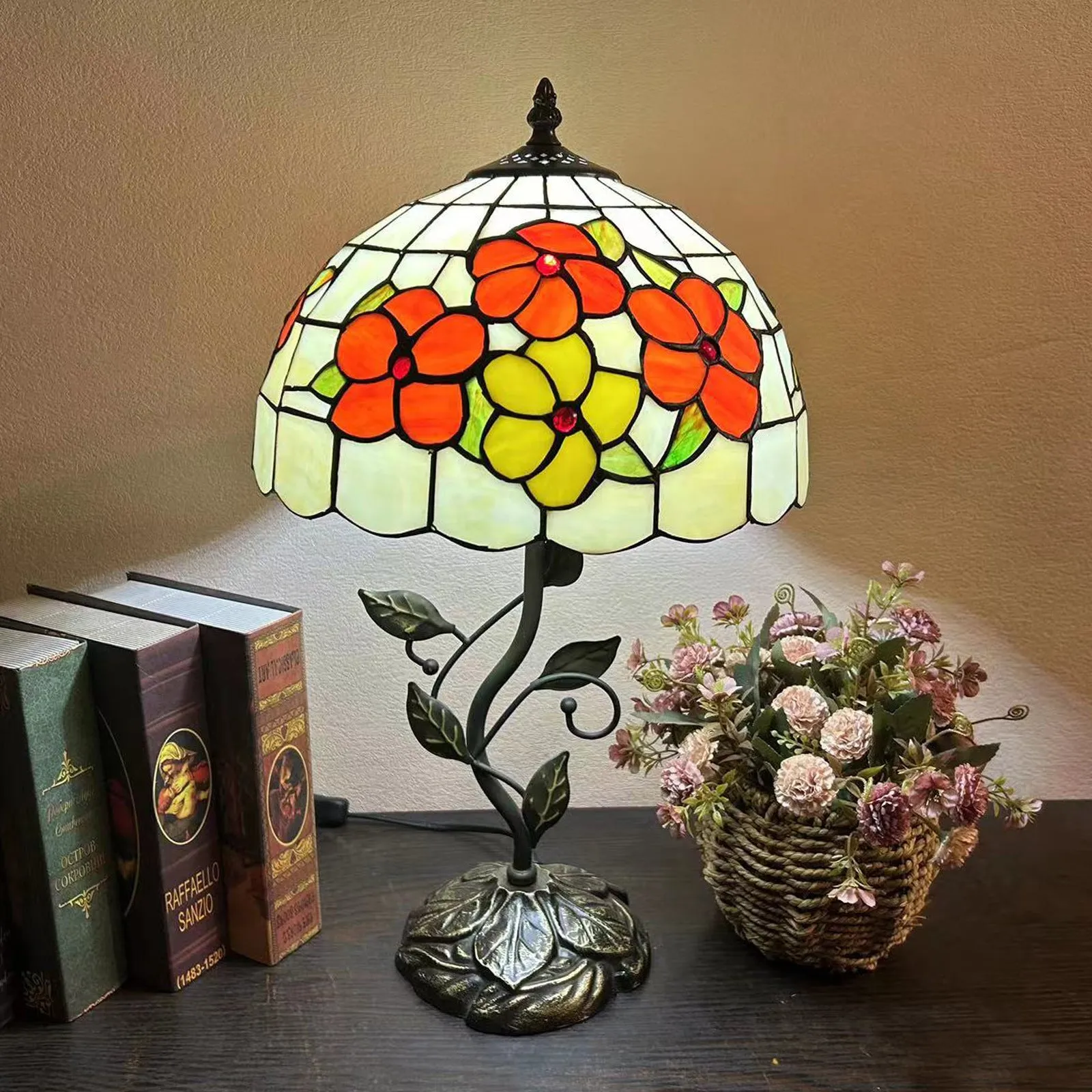 American Pastoral Tiffany 12-inch table lamp with coloured glass shade and resin base, 30 cm wide
