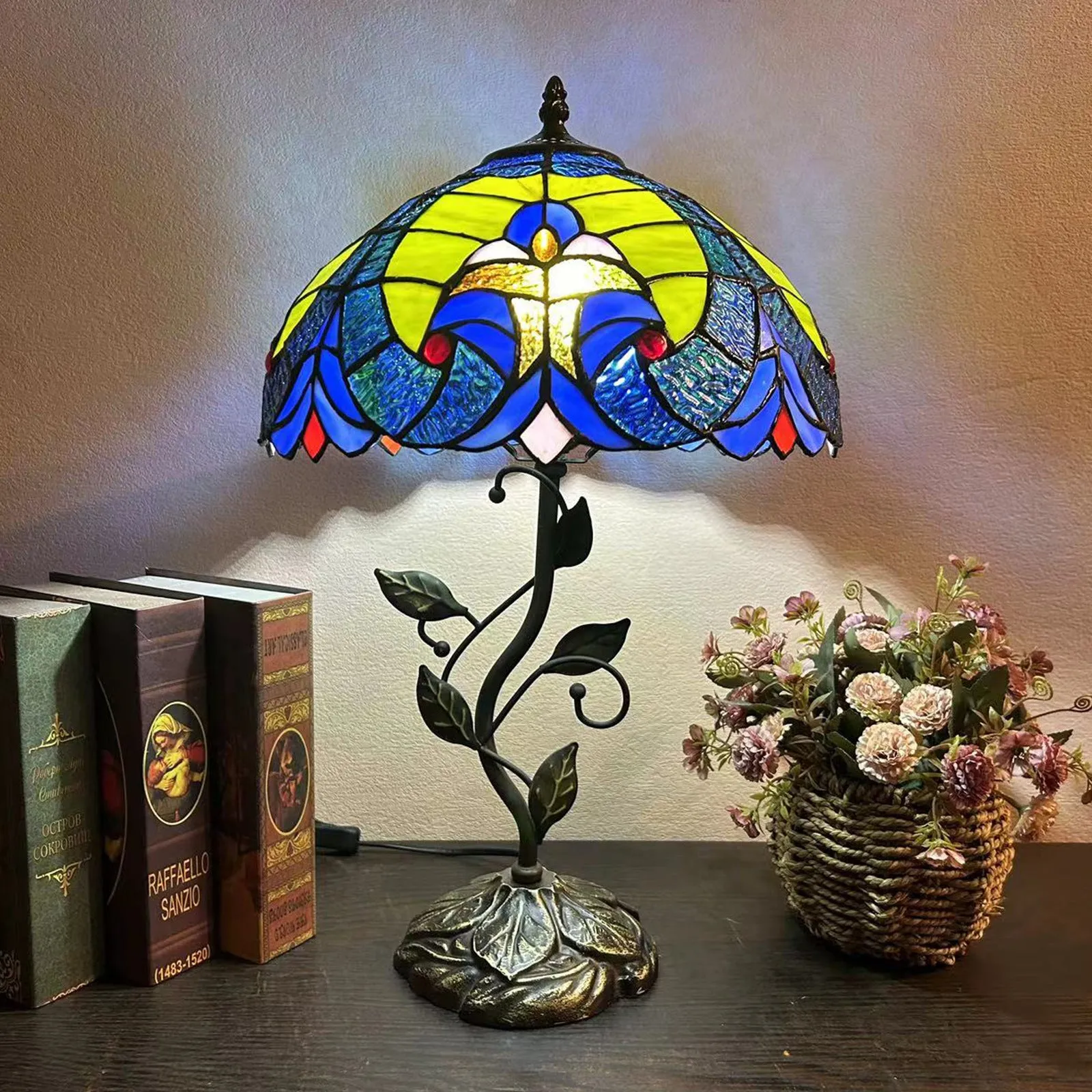 American Pastoral Tiffany 12-inch table lamp with coloured glass shade and resin base, 30 cm wide
