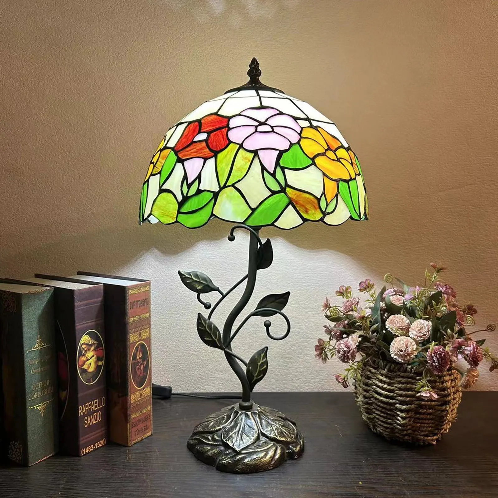 American Pastoral Tiffany 12-inch table lamp with coloured glass shade and resin base, 30 cm wide