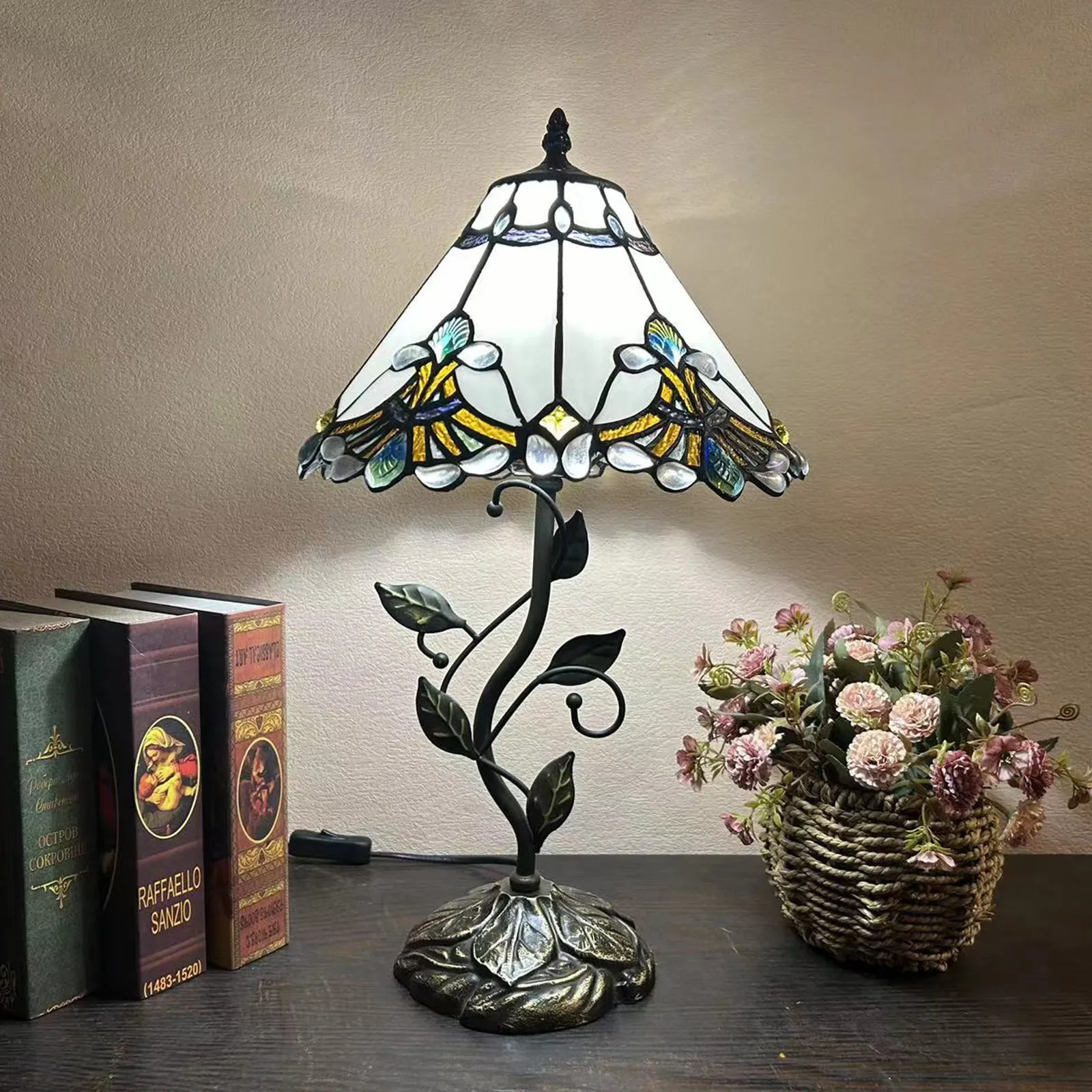 American Pastoral Tiffany 12-inch table lamp with coloured glass shade and resin base, 30 cm wide